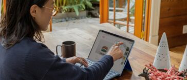 a woman using a laptop