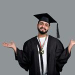 a man wearing a graduation cap and gown