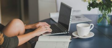 person using black and silver laptop computer