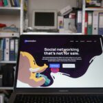 a laptop computer sitting on top of a desk