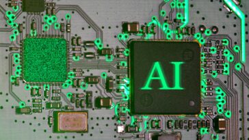 Glowing ai chip on a circuit board.