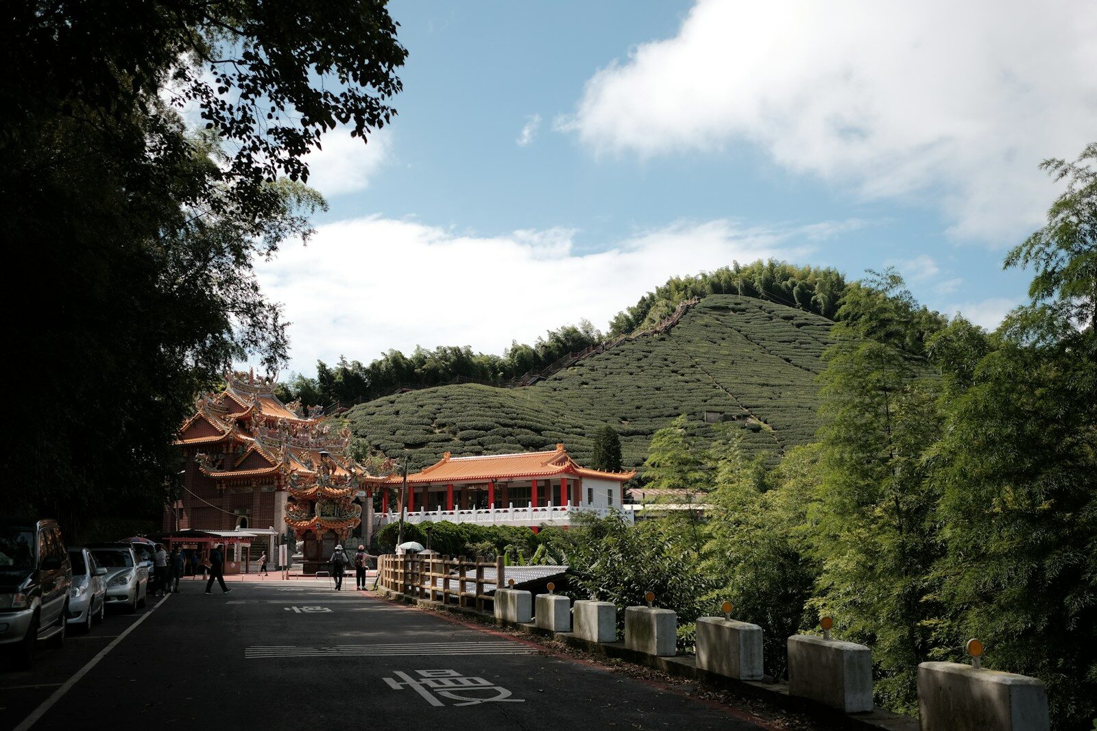 a street with a hill in the background