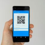 black android smartphone displaying qr code