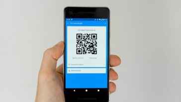 black android smartphone displaying qr code